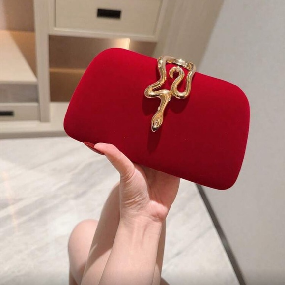 Elegant Red Clutch with Gold Snake Design  Accent